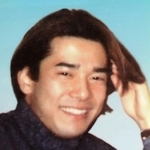 岡部正則さん。震災の３日前、友人が居酒屋で撮影した