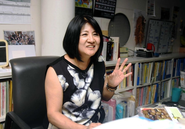 「色んな人と助け合うことを忘れてはならない」と訴える吉富志津代さん＝神戸市長田区海運町３